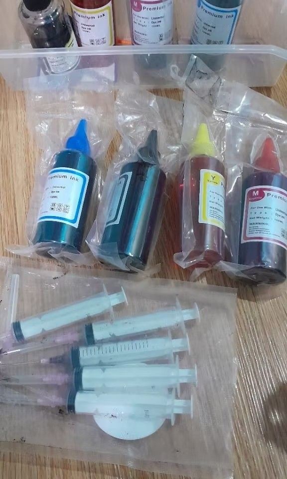 Printer ink (Category: Printers, Scanners & Copiers) located in Singapore. Submitted by shaza167 (Listing ID 1347425625, Image 1). Description: replacement ink. 4 new n unopened. the others just opened to try. take all for $15.