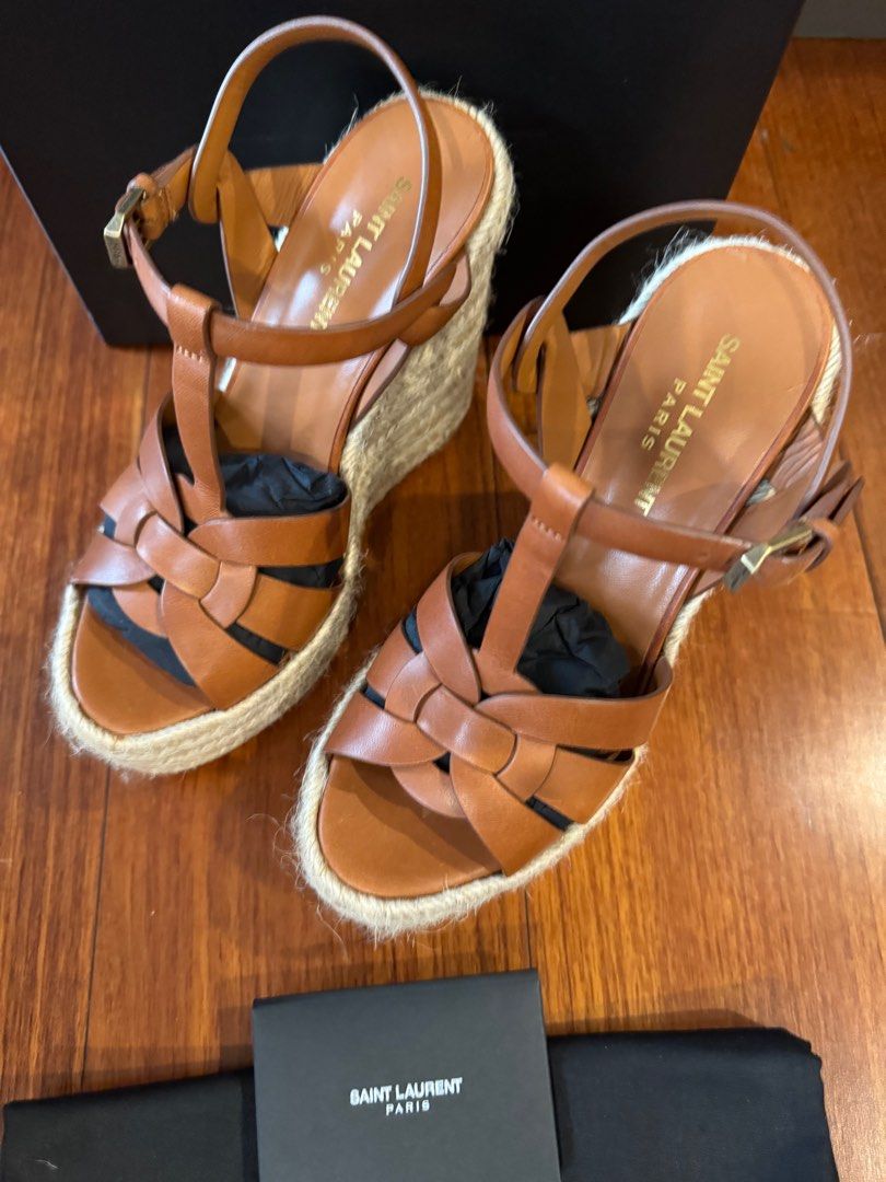 SAINT LAURENT Tribute 130 leather espadrilles (Category: Sneakers & Footwear) located in Muntinlupa City. Submitted by bagstagram (Listing ID 1347378025, Image 2). Description: Saint Laurent’s Tribute espadrilles are a warm-weather staple. Finished with 130 wedge heels, this style has been crafted in Spain in a timeless tan colorway for effortless sunshine chic. Upper: calf leather Lining: leather Sole: leather insole, rubber sole Toe shape: almo