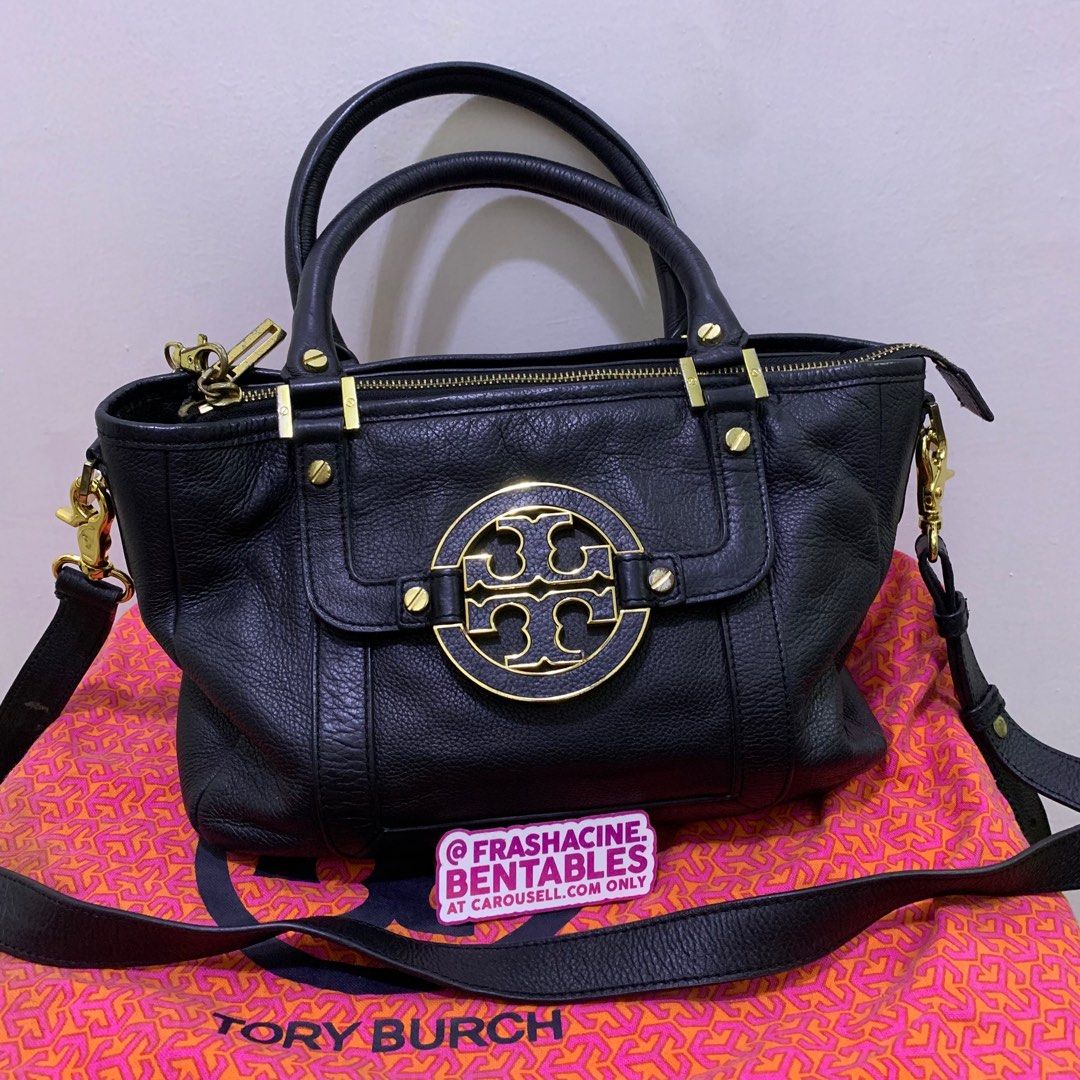 Tory Burch Black Leather Mini Amanda Tote (Category: Luxury Bags & Wallets) located in Paranaque City. Submitted by frashacinedeclutters (Listing ID 1347392589, Image 2). Description: Authentic! Comes with original dust bag. Wallet has no box. Well used but still in really good condition. RFS: Lola’s moving abroad, she can’t take this with her *Always negotiable, send me a dm :-).