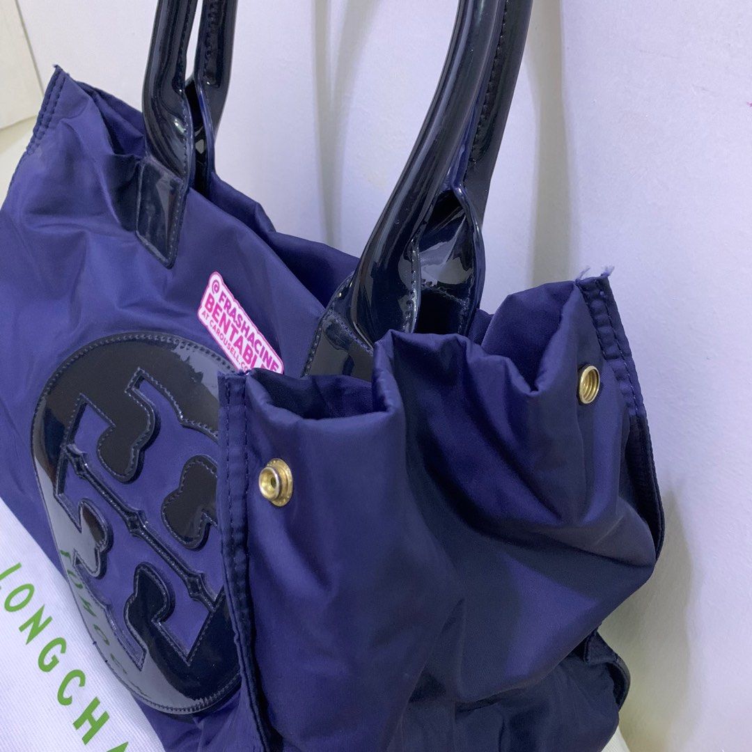 Tory Burch Ella Classic Navy Blue Tote (Category: Luxury Bags & Wallets) located in Paranaque City. Submitted by frashacinedeclutters (Listing ID 1347393644, Image 2). Description: Authentic! Bought secondhand, Longchamp dust bag came with it. Well used but still in really good condition. RFS: Lola’s moving abroad, she can’t take this with her *Always negotiable, send me a dm :-).