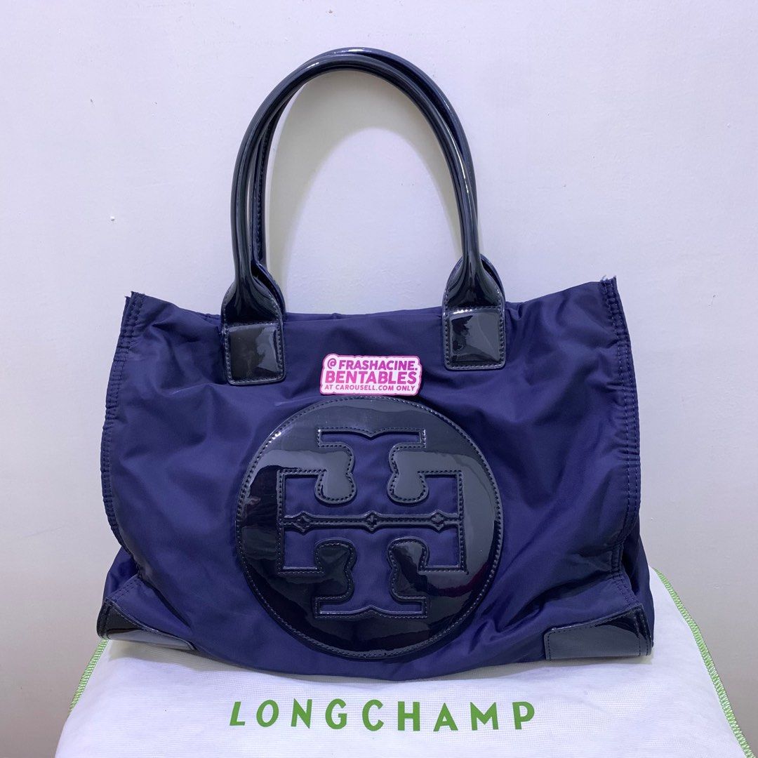 Tory Burch Ella Classic Navy Blue Tote (Category: Luxury Bags & Wallets) located in Paranaque City. Submitted by frashacinedeclutters (Listing ID 1347393644, Image 1). Description: Authentic! Bought secondhand, Longchamp dust bag came with it. Well used but still in really good condition. RFS: Lola’s moving abroad, she can’t take this with her *Always negotiable, send me a dm :-).
