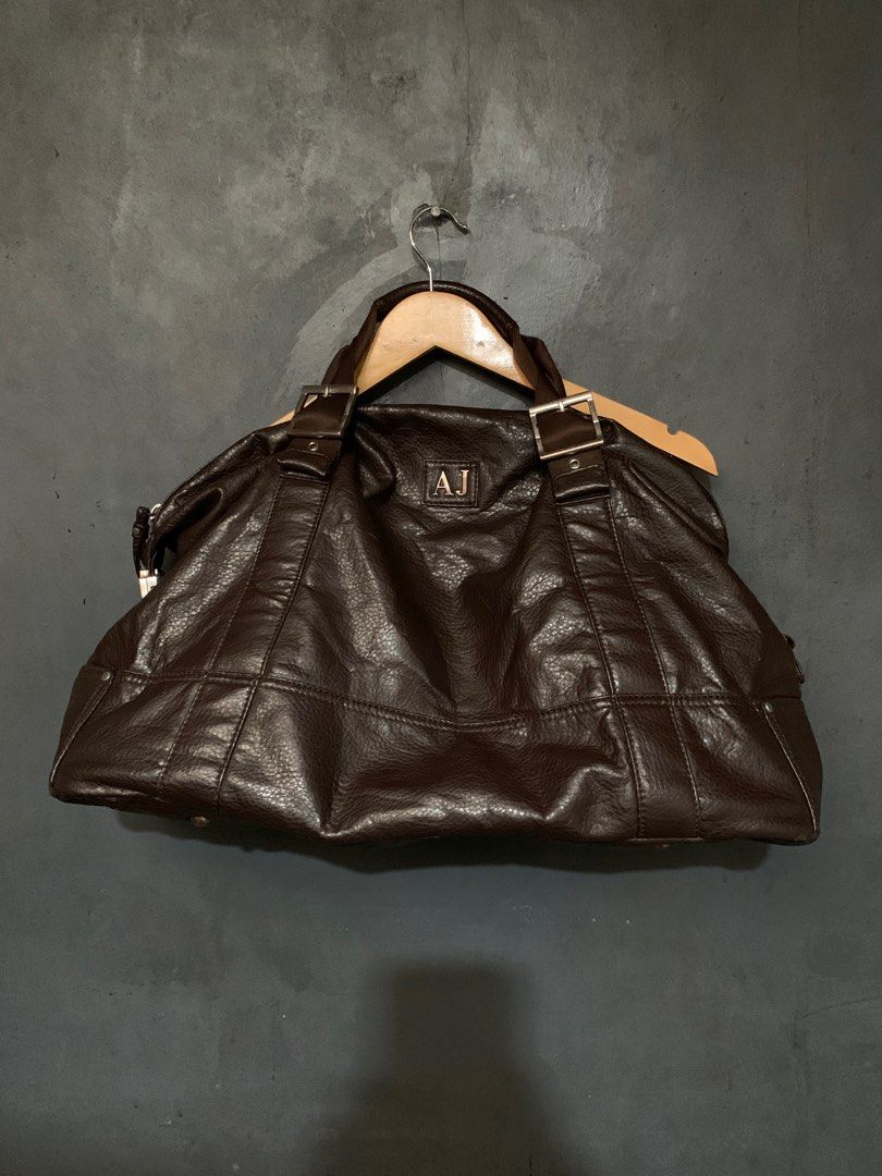 ARMANI JEANS (Category: Luxury Bags & Wallets) located in Butuan. Submitted by 8600_recycled.hyp3 (Listing ID 1347491297, Image 1). Description: Armani Jeans leather bag 21Wx15L Excellent minor scratch negotiable.