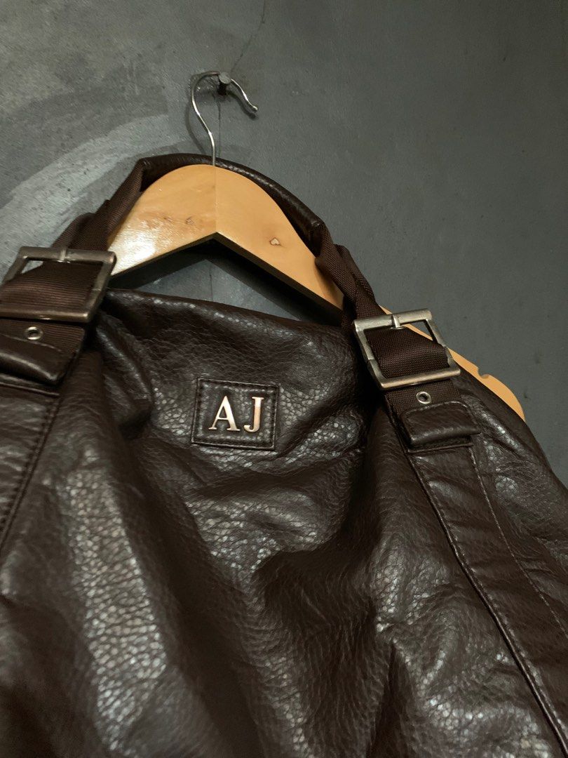 ARMANI JEANS (Category: Luxury Bags & Wallets) located in Butuan. Submitted by 8600_recycled.hyp3 (Listing ID 1347491297, Image 2). Description: Armani Jeans leather bag 21Wx15L Excellent minor scratch negotiable.