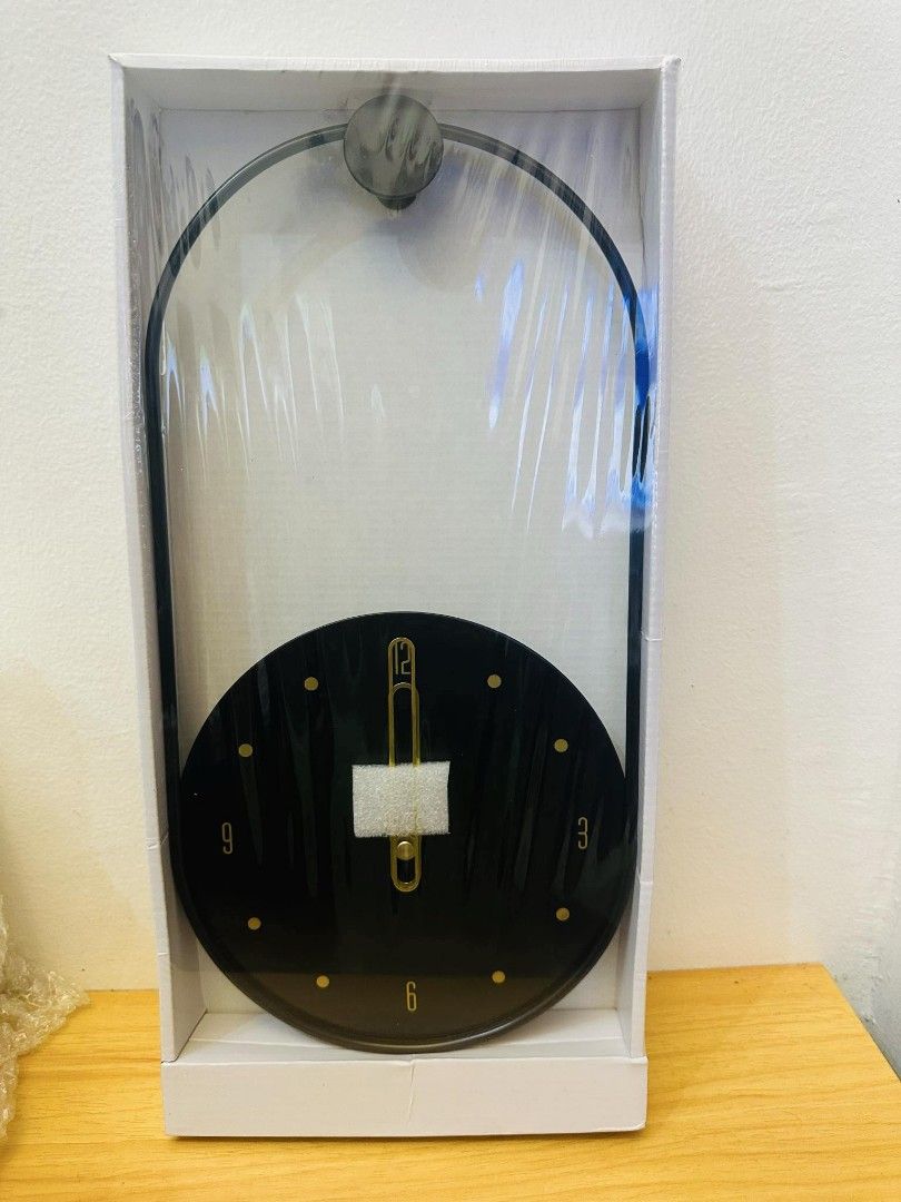 Black with gold details stylish analog clock (Category: Clocks) located in Mandaluyong City. Submitted by home_box.ae (Listing ID 1347480065, Image 2). Description: actual photo posted on hand ready to ship.