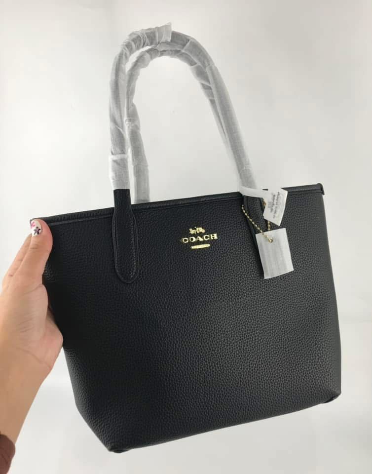 Coach small city tote ❗️ (Category: Luxury Bags & Wallets) located in Las Pinas. Submitted by yhn_boutique (Listing ID 1347656310, Image 1). Description: Complete inclusions Bnew New arrival .