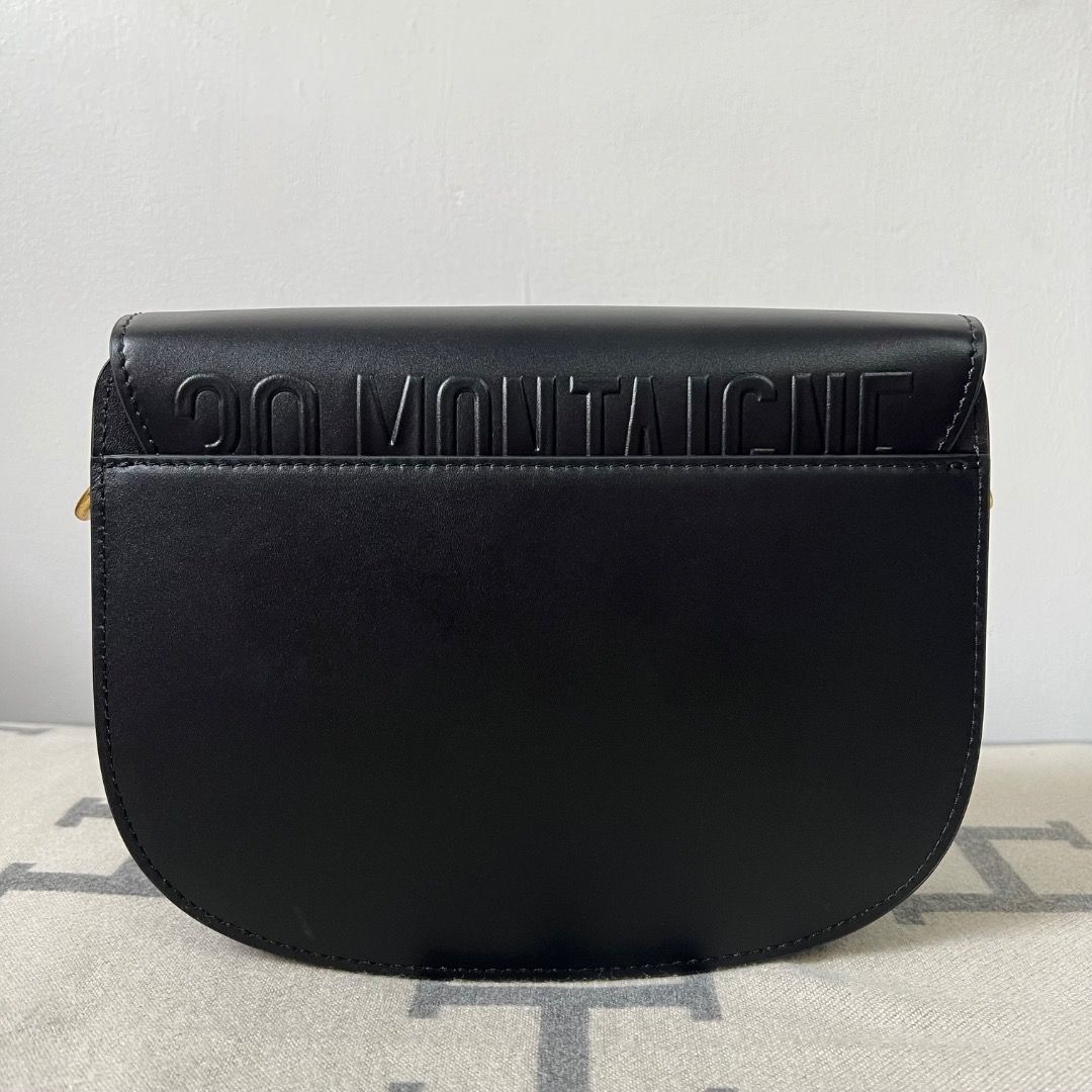Dior Bobby Medium Bag Black Box Calfskin (Category: Luxury Bags & Wallets) located in Antipolo. Submitted by chanchimj (Listing ID 1338782047, Image 3). Description: The medium silhouette is crafted from cognac-colored box calfskin with a supple suede calfskin interior, and is enhanced by antique gold-finish metal hardware. Its removable and adjustable shoulder strap has a military-inspired buckle and allows it to be carried by hand, worn over th