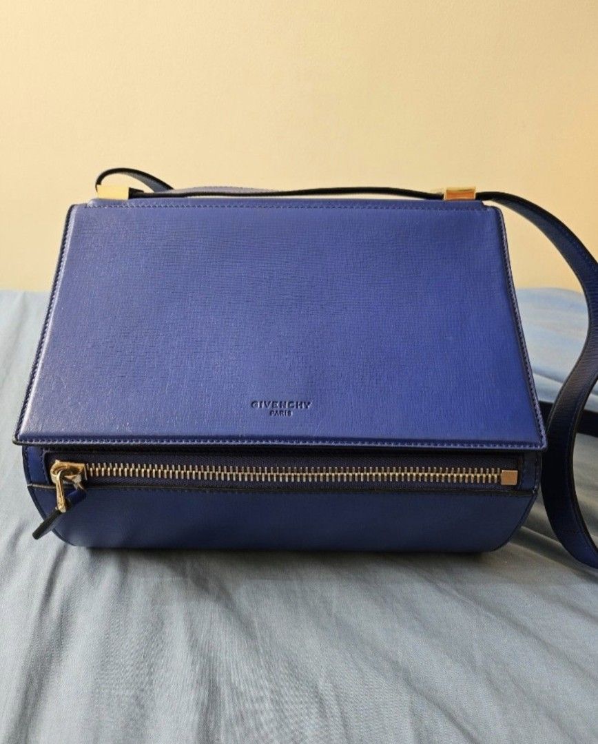 Givenchy Pandora (Category: Luxury Bags & Wallets) located in Manila. Submitted by shoppingspree008 (Listing ID 1347610859, Image 2). Description: Best priced in the market.Pandora medium in box.Guaranteed authentic.Money back guarantee if proven fake by legitimate authenticator. rare and super steal. some are in sale for 40k plus in the market. check my other listing for sale items. Last price posted. I reduced it from 20k already.