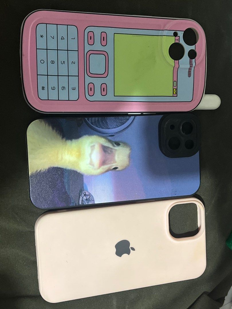 iphone 13 phone case (Category: Cases & Sleeves) located in Bacolod City. Submitted by girlydecluttering (Listing ID 1347528581, Image 3). Description: 150 each 380 if u buy 3 mostly brand new yung pink with iphone logo and buttercup lang yung used .