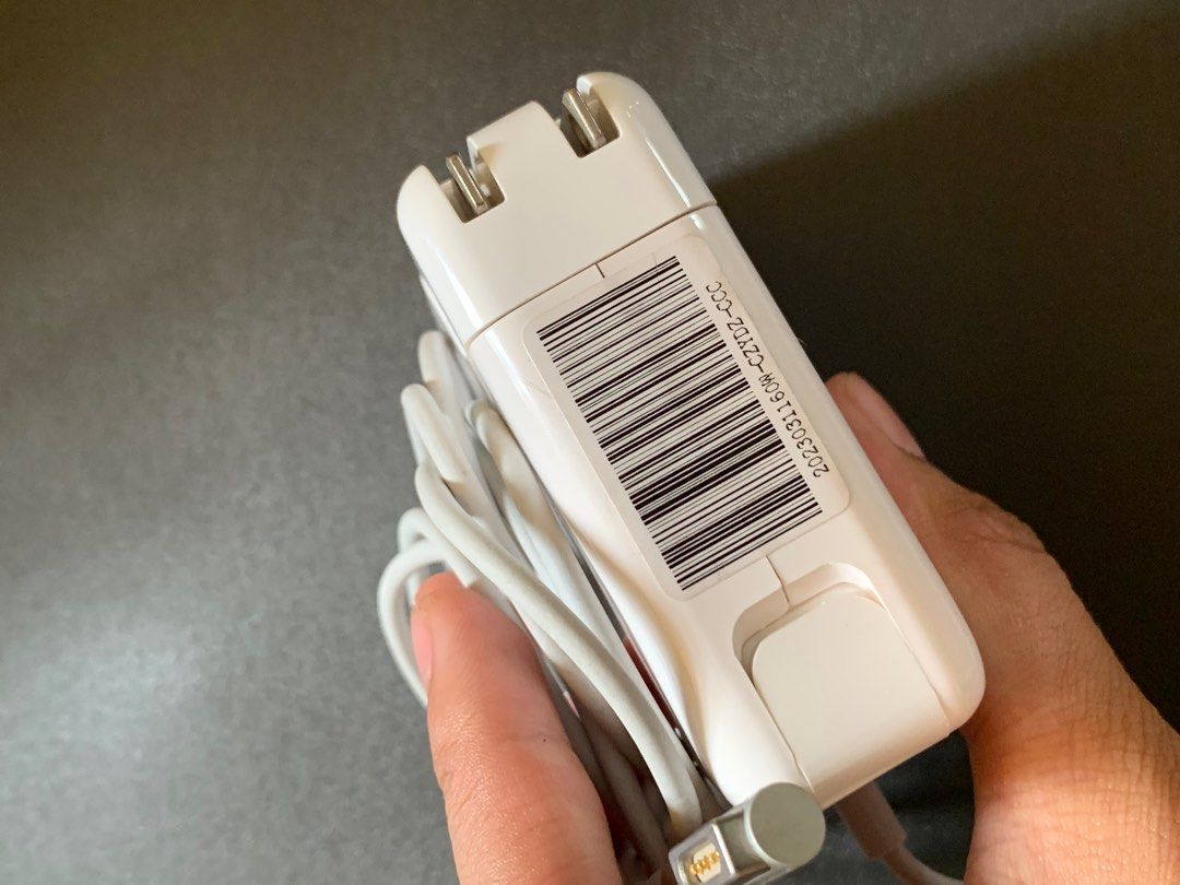 Macbook Apple Charger 60W L TIP (Category: Chargers) located in Valenzuela. Submitted by goldcogo31 (Listing ID 1347488284, Image 3). Description: Brand: ILANO Bought for: 1,800 (First Class Dupe) Reason for selling: Never been used. Macbook broke Condition: Working perfectly well. Comes with a box. Perfect for old macbook models .