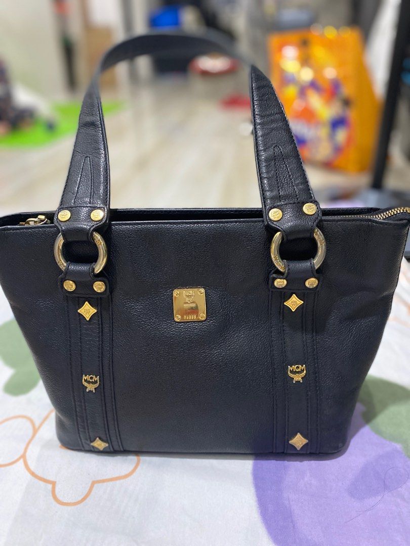 MCM Shoulder Bag (Category: Luxury Bags & Wallets) located in Imus. Submitted by victorious28 (Listing ID 1347573664, Image 1). Description: Coded Authentic Genuine leather Walang bakbak Can be handbag or shoulder bag Flaw: faded hardware and rubs sa leather sa loob .