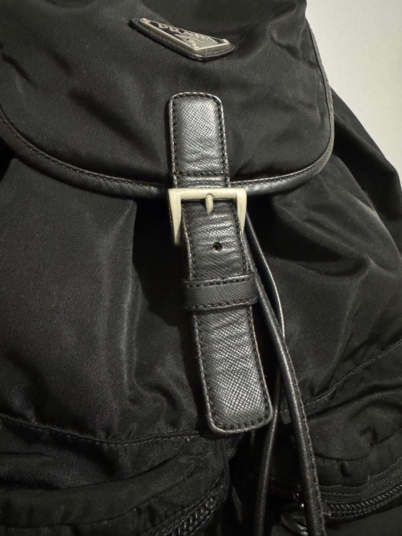 Prada Nylon Backpack (Category: Luxury Bags & Wallets) located in Pasig City. Submitted by mr.arc (Listing ID 1347507012, Image 3). Description: Selling my pre-loved Prada nylon backpack. Mainly used for work Approx 28.0 x 36.5 x 15.0 Vintage condition expect watermarks and minor flaws Still negotiable Gcash or Bank Transfer Shipping shouldered by buyer within Metro Manila only. ❗️No returns Please be sure to check photos before buying. .
