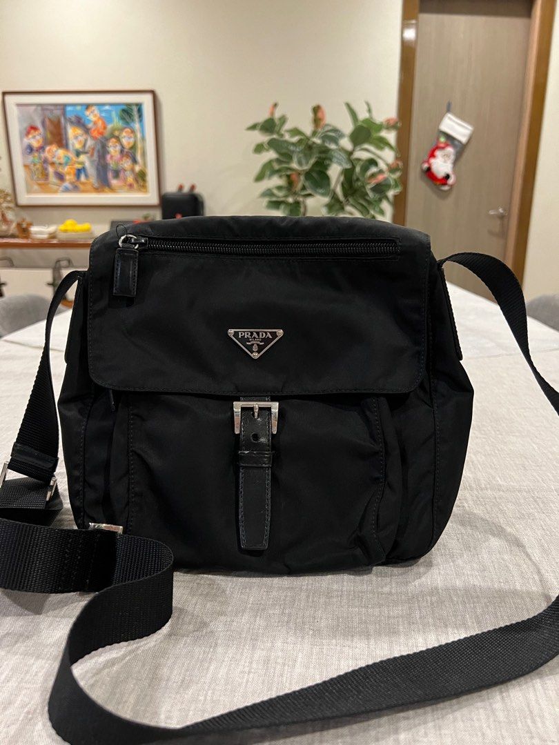 Prada Sling Bag (Category: Luxury Bags & Wallets) located in Manila. Submitted by solar_madness (Listing ID 1347587619, Image 2). Description: Prada Tessuto Men’s Sling Bag Condition: Excellent, Rank 9.3/10 Color: Black Material: Black Tessuto Nylon / Leather in Silver Hardware Inclusion: Bag only ⚡️Last price posted. No haggling please ⚡️Best Deal for the quality Shipping: via lalamove/grab/lbc cop Meet-ups: southwoods area or atc/festival mall 