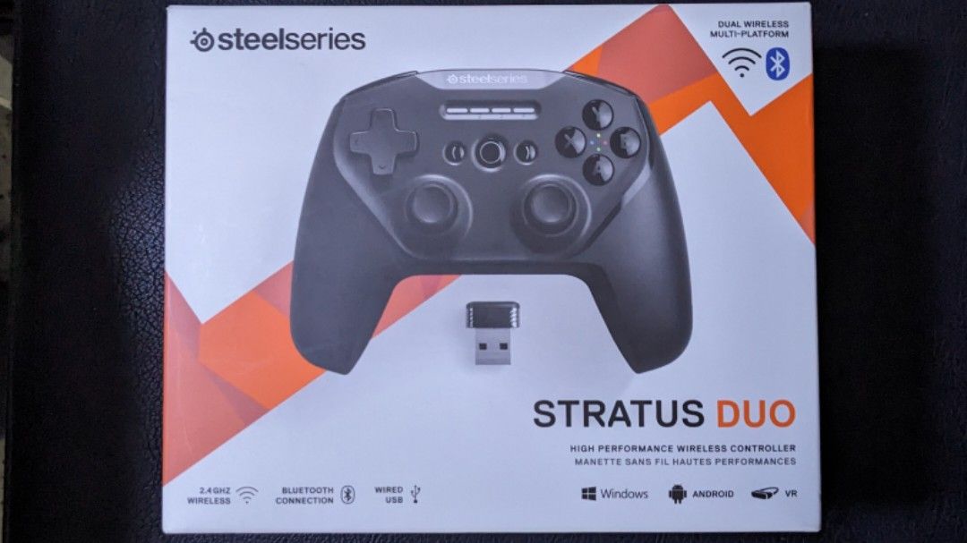 Steelseries Stratus Duo PC and mobile controller (Category: Controllers) located in Quezon City. Submitted by keikomizer (Listing ID 1347550204, Image 1). Description: Works for PC (bluetooth or wifi dongle) and mobile phones (bluetooth). Excellent battery life. Thumbstick rubber has stains but not worn out. Can be cleaned if needed but I use thumbstick covers instead for better grip and protection..