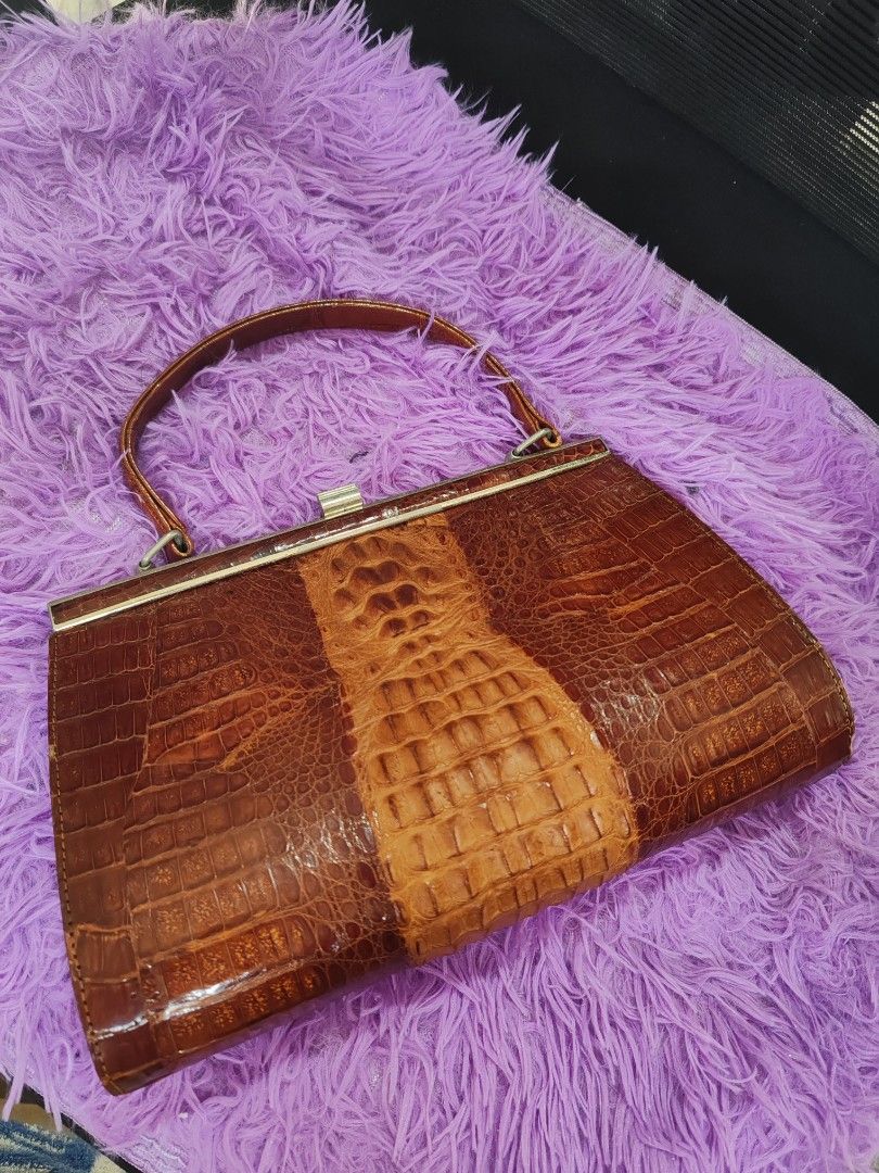 Croc leather handbag (Category: Luxury Bags & Wallets) located in Taguig. Submitted by emz0923 (Listing ID 1347840558, Image 1). Description: Firm on price, highly collectible.