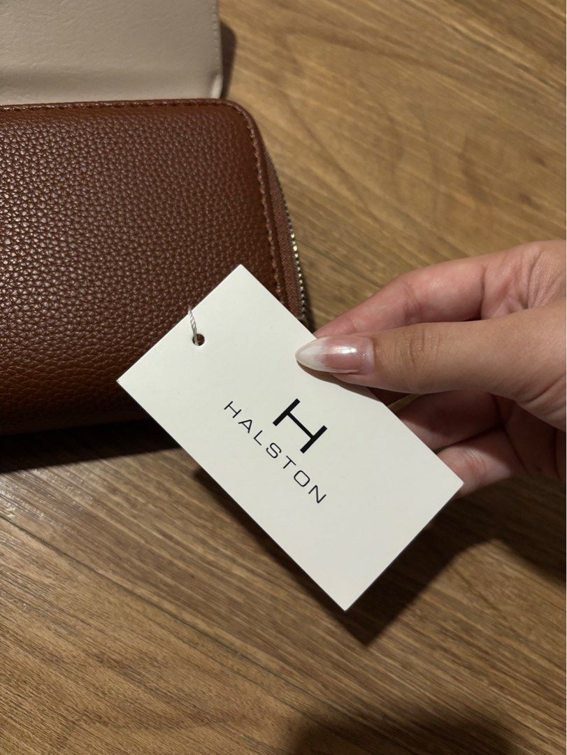 Halston: Brown Long Wallet (Category: Luxury Bags & Wallets) located in Paranaque City. Submitted by floramese (Listing ID 1347687788, Image 2). Description: Never used, just stored. ✿ bought from the states Modes of Payment – GCash – Maya – PNB – EastWest.