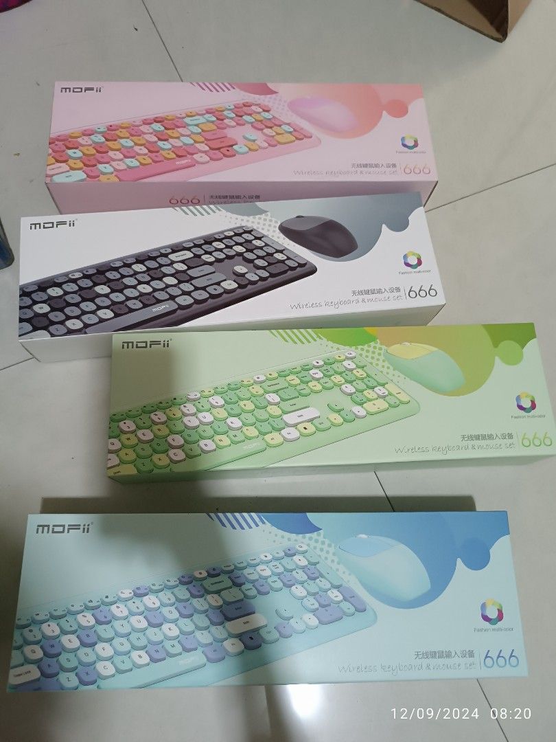 Mofii wireless keyboard with mouse (Category: Computer Keyboard) located in Quezon City. Submitted by lycegoroca (Listing ID 1340314585, Image 2). Description: Brand new Mofii keyboard set with wireless mouse available colors: Gray blue green pink purple location: Balintawak QC.
