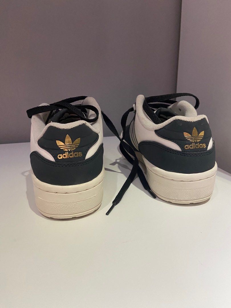 SALE PRELOVED Rivalry Low Shoes (Category: Sneakers) located in Quezon City. Submitted by k_ly45 (Listing ID 1347743787, Image 3). Description: US WOMEN : 7 1/2 UK 6 SLIGHTLY USED GOOD CONDITION WITH BOX ORIGINAL Details Regular fit Lace closure Synthetic upper with nubuck overlays Terry lining Rubber cupsole Colour: Carbon / Talc / Cloud White Product code: ID7560.