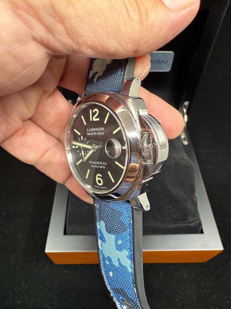 Panerai Pam 104 (Category: Luxury Watches) located in Manila. Submitted by b_bleu (Listing ID 1347842783, Image 2). Description: Pam 104 Complete with box, papers, black rubber and black unused leather strap With blue Panerai camouflage strap .
