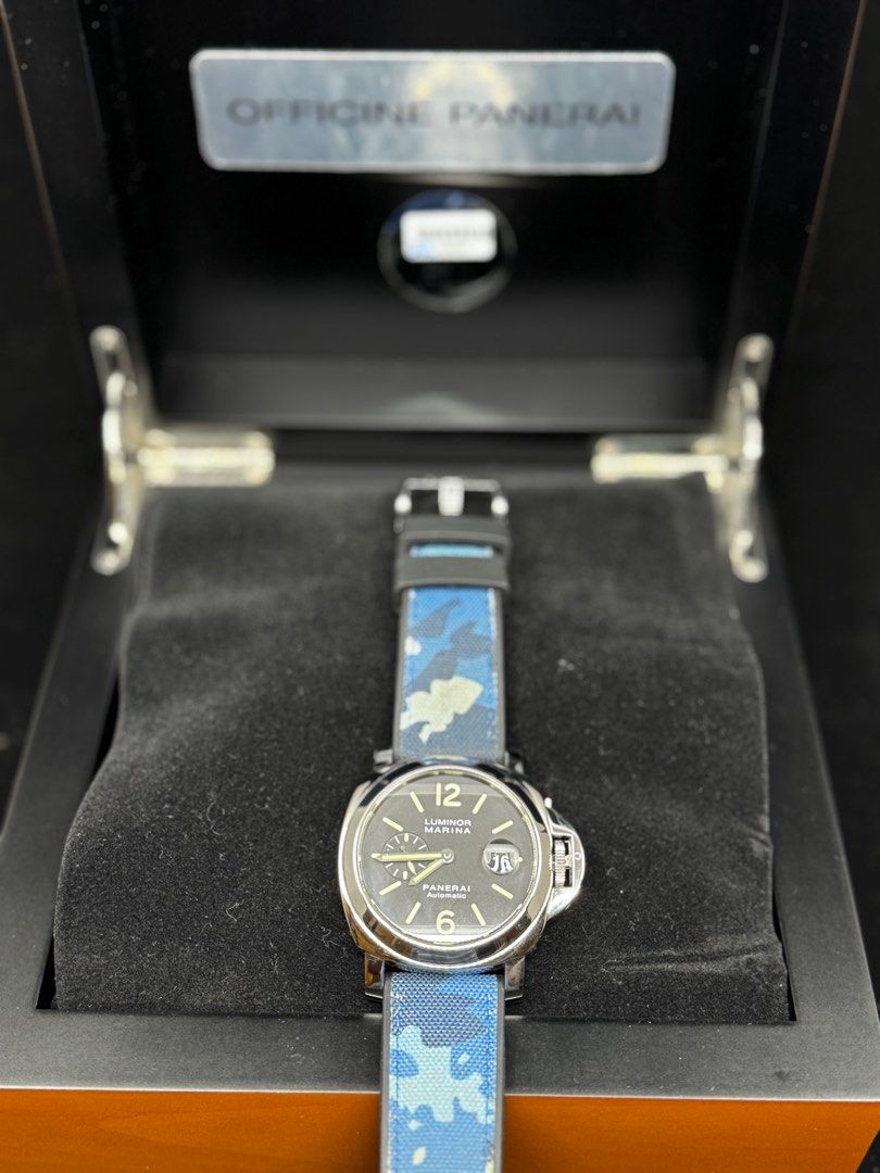 Panerai Pam 104 (Category: Luxury Watches) located in Manila. Submitted by b_bleu (Listing ID 1347842783, Image 3). Description: Pam 104 Complete with box, papers, black rubber and black unused leather strap With blue Panerai camouflage strap .