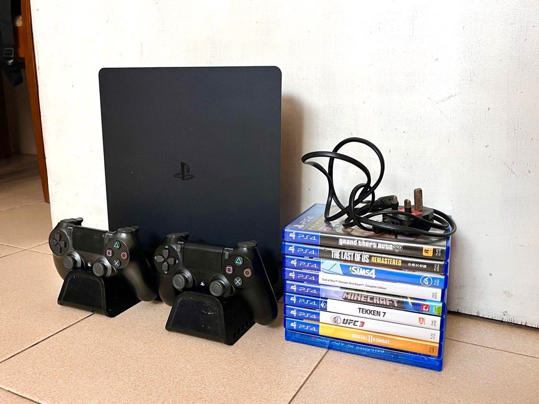 PS4 SLIM 1TB w 9 GAMES (Category: PlayStation) located in Tarlac. Submitted by thriftniaki (Listing ID 1347727948, Image 3). Description: PS4 Slim 1TB with 2 orig ds4 controller (yung GRAY naalog lng yung battery di ma on wala ng time magpaayos paayos nyo nlng) Inclusion: HDMI Cable Power Cable Charging Cable Charging Mount with 9 games na kasama TLOU Remastered GTA V UFC3 Mortal Kombat 11 Minecraft Sims 4 God Of War Horizon Zero Dawn Call Of Dut