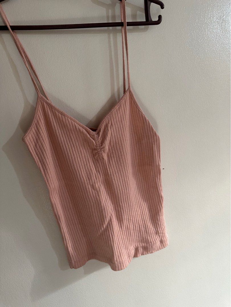 Topshop Ribbed Tank Top (Category: Sleeveless) located in Quezon City. Submitted by hellowtoall (Listing ID 1347844569, Image 1). Description: Topshop tank top in pink. No signs of usage tbh. Frames the body well. Rfs: don’t reach for it anymore. decluttering. .