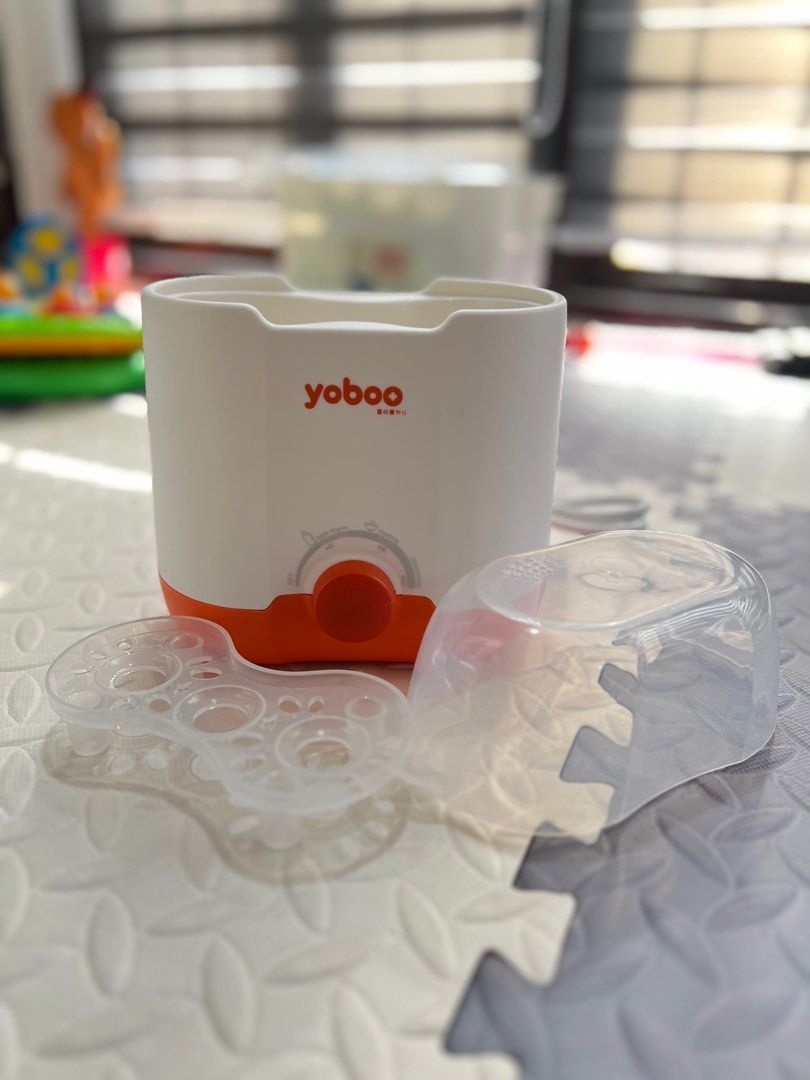 Yoboo Milk Warmer and Bottle Sterilizer (Category: Breastfeeding & Bottle Feeding) located in Makati City. Submitted by ljmc06 (Listing ID 1347668941, Image 2). Description: .