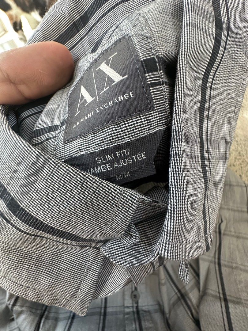 Authentic Armani Exchange Long Sleeves Checkered Gray Medium (Category: Formal Shirts) located in Pasig City. Submitted by mrdecluttering_ph (Listing ID 1347851602, Image 2). Description: Authentic Armani Exchange Long Sleeves Gray Checkered Dimensions: width 46cm length 74cm Medium Slim Fit Rfs decluttering Negotiable Delivery fee c/o buyer.