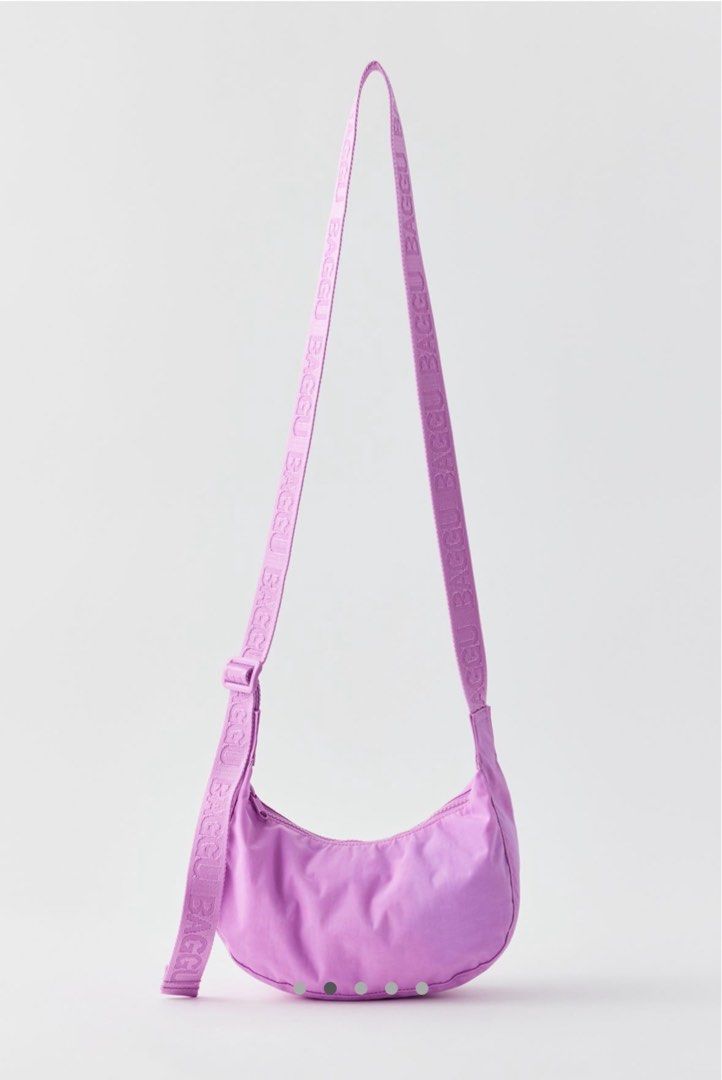 Baggu Small Nylon Crescent Bag Light Arctic Pink (Category: Cross-body Bags) located in Manila. Submitted by zlook (Listing ID 1347882848, Image 2). Description: Retails for 48 USD 1 stock only BAGGU small nylon crescent bag. BAGGU’s crescent bag in a smaller size that’s effortlessly casual and just roomy enough to carry your most-needed essentials. Comfy BAGGU shoulder bag silhouette with an adjustable tonal logo strap, it wears comfortably acro