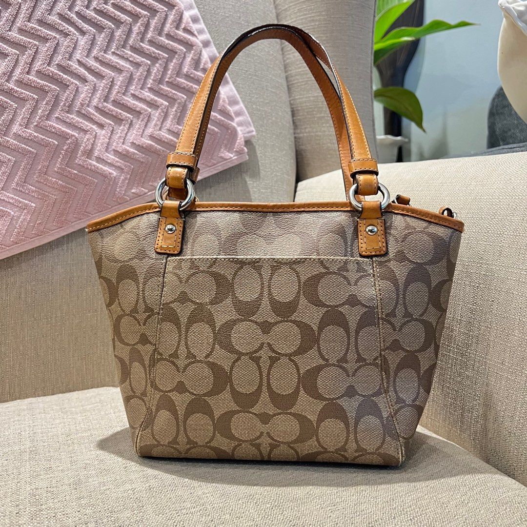 Coach Mini Tote kili bag (Category: Luxury Bags & Wallets) located in Paranaque City. Submitted by missb1001 (Listing ID 1347985287, Image 2). Description: Please check photos carefully! Issues: Signs of use on the handles rubbings on the bag’s bottom corners Missing long strap Size: L 10” x H 8” Strap drop: approx 8.5” Shipping c/o buyer Mop: gcash or bank transfer This is a pre-loved bag, meaning it’s not brand new, so manage your expectations.