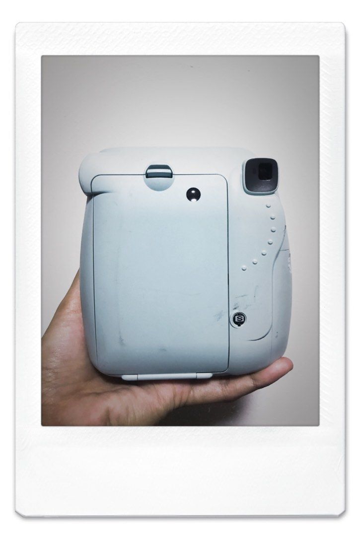 [DEFECTIVE] Instax Mini 8 Icy Blue (Category: Cameras) located in Manila. Submitted by the.red.rack (Listing ID 1347996542, Image 3). Description: BUY AT YOUR OWN RISK! Issue: Di na nag-oopen pero nung nilagyan ng battery bumalik siya sa “S” No time para ipaayos Pwede swap sa 2-3 Films (Pwedeng expired) Instax Mini Film Contact Sheet Instax Mini Film 20s Loc: Diliman, Qc No to CoD Pwede cash upon meetup para macheck niyo rin LAST PRICE POSTED.