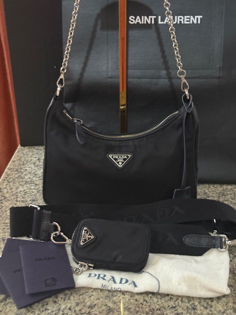 Guaranteed authentic Prada re ed multipochette (Category: Luxury Bags & Wallets) located in Naga. Submitted by akimadison.ph (Listing ID 1347930556, Image 2). Description: Comes with pouch, strap, dustbag and cards (paper cards no more white card lost it) .
