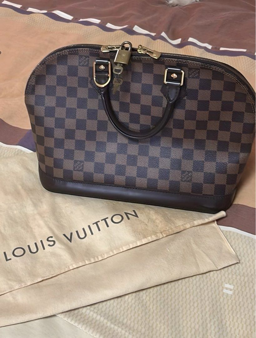 Louis Vuitton Alma Damier (Category: Luxury Bags & Wallets) located in Pasig City. Submitted by watch_up.mnl (Listing ID 1347875366, Image 1). Description: FOR SALE Louis Vuitton - Alma Damier - Dust bag - Keys P45,000 Cash/Gcash/Bank Transfer *Used but not abused *Minor aesthetic flaws *Bought in LV Paris years ago *Authenticated by LegitGrails Rfs: my mother unloading her bag collection, you can check personally for its legitimacy Location: Pas