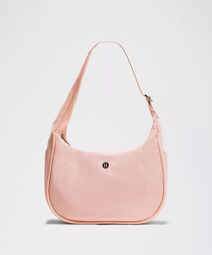 Lululemon Pink Mist Shoulder Bag 4L (Category: Shoulder Bags) located in Manila. Submitted by zlook (Listing ID 1347883885, Image 1). Description: limited edition Pink Mist Color (ballet pink) not available on Lululemon, already sold out On hand already and sealed, will update pictures Adjustable shoulder strap for comfortable carrying Exterior zippered pocket to secure your valuables Side drop-in pockets Zippered main compartment Interior pocket