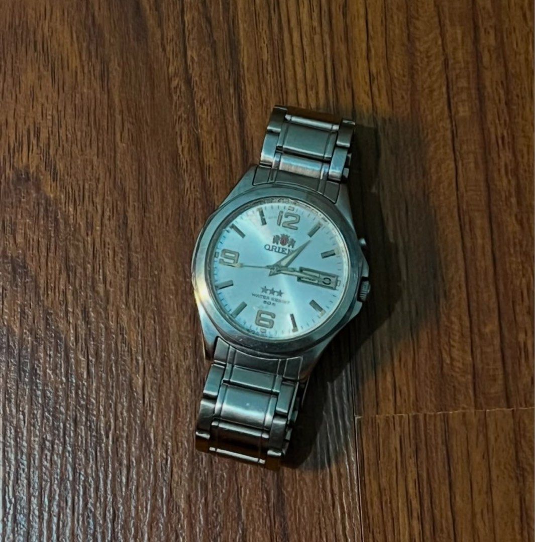 Orient Tri-star (Category: Men's Watches) located in Pasig City. Submitted by ukaygodd (Listing ID 1347931105, Image 2). Description: Ortient Tri Star ORIENT FEM5C00UB9 Automatic . White dial with visible hairline scratches (u can have it buffed if u want) Clean slim fit on wrist, classy dial In good working condition . 38mm - 39mm face size.