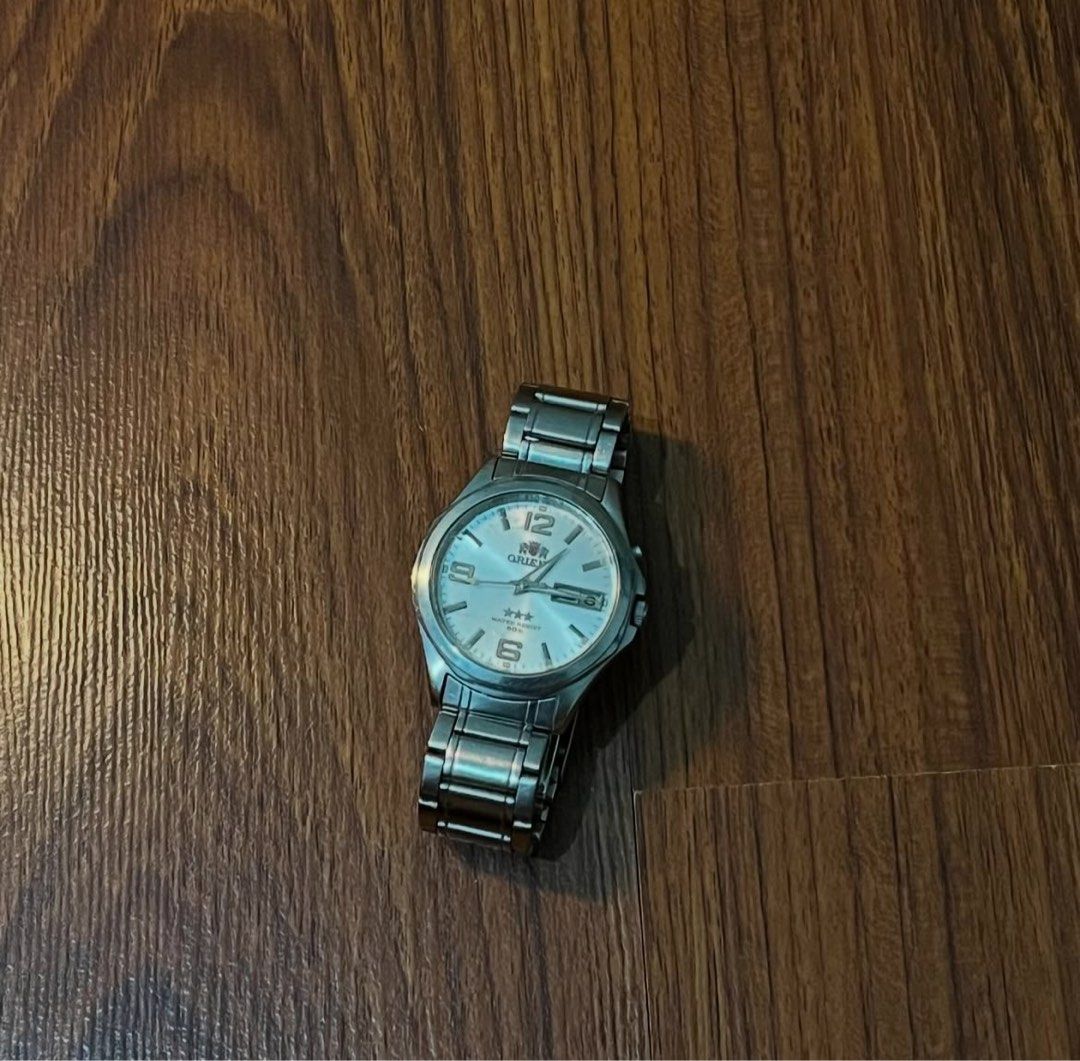 Orient Tri-star (Category: Men's Watches) located in Pasig City. Submitted by ukaygodd (Listing ID 1347931105, Image 1). Description: Ortient Tri Star ORIENT FEM5C00UB9 Automatic . White dial with visible hairline scratches (u can have it buffed if u want) Clean slim fit on wrist, classy dial In good working condition . 38mm - 39mm face size.