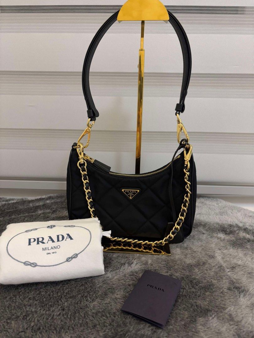 Prada Re-Edition 1995 Chaîne Re-Nylon mini-bag (Category: Luxury Bags & Wallets) located in Las Pinas. Submitted by Le.Pattie.Luxe (Listing ID 1347857796, Image 1). Description: 💯% authentic 𝐏𝐫𝐚𝐝𝐚 𝐑𝐞-𝐄𝐝𝐢𝐭𝐢𝐨𝐧 𝟏𝟗𝟗𝟓 𝐐𝐮𝐢𝐥𝐭𝐞𝐝 𝐍𝐲𝐥𝐨𝐧 𝐂𝐡𝐚𝐢𝐧 𝐁𝐚𝐠 🖤𝐏𝐡𝐩 𝟔𝟗.𝟓𝐤🖤 ▪️Color: black ▪️Almost new condition ▪️Microchip ▪️W/ chain strap & adjustable saffiano leather strap ▪️Inclusions: clochette, dustbag, & 2 straps 💯% a