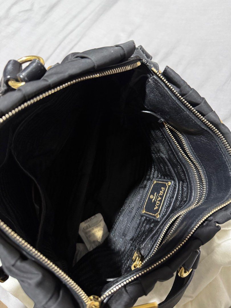 Prada Tessuto Gaufre Nylon Bag (Category: Bags & Wallets) located in Singapore. Submitted by aurora211 (Listing ID 1348002360, Image 3). Description: Not for fussy buyers Still in good condition Comes with dustbag Lost the receipt but 100% authentic .