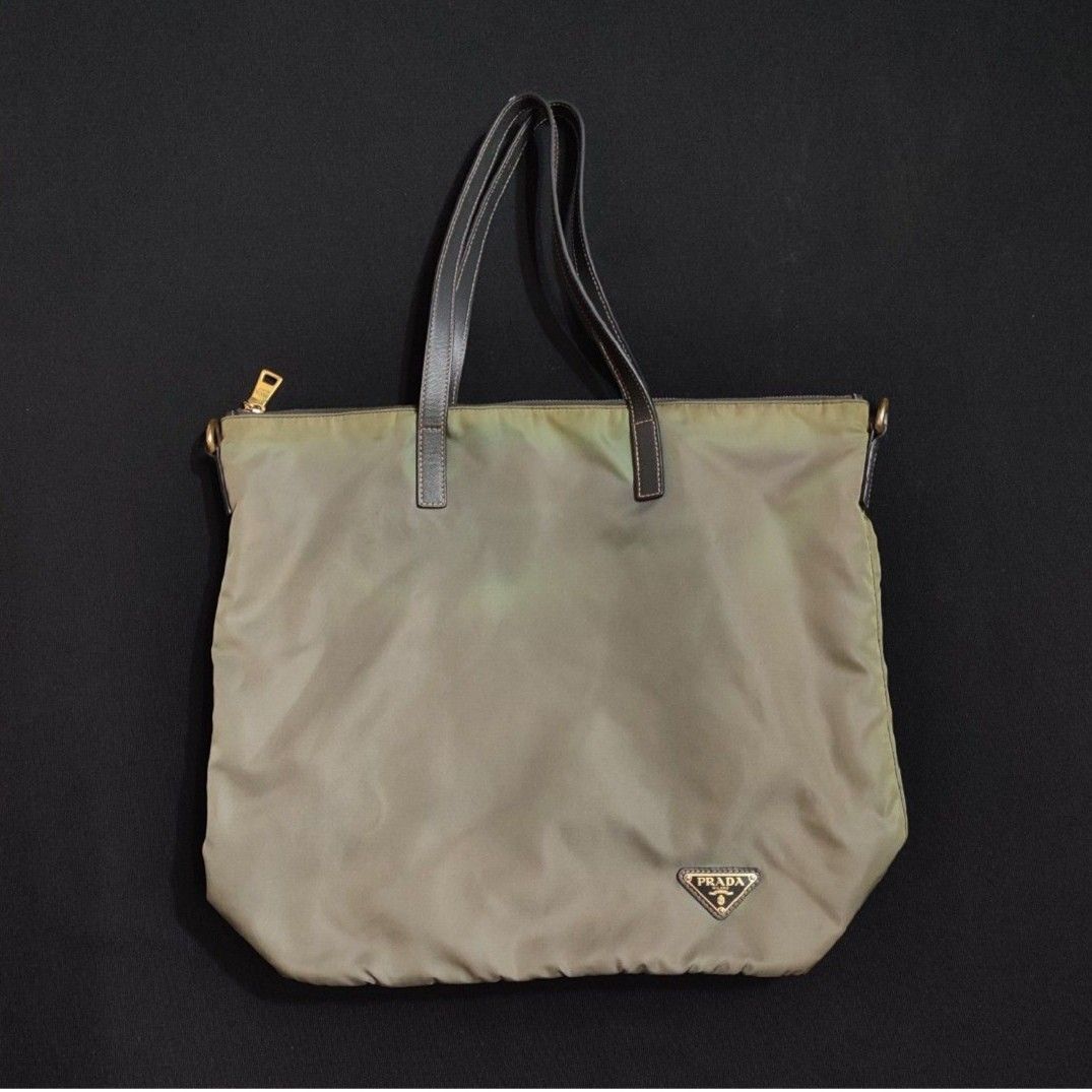 Prada Tessuto Nylon Bag (Category: Luxury Bags & Wallets) located in Manila. Submitted by shoptrinketscloset (Listing ID 1347969890, Image 1). Description: Authentic Prada Nylon Tessuto Bag Long strap not included Pls see photos for flaws as is where is sf c/o buyer location malate manila.