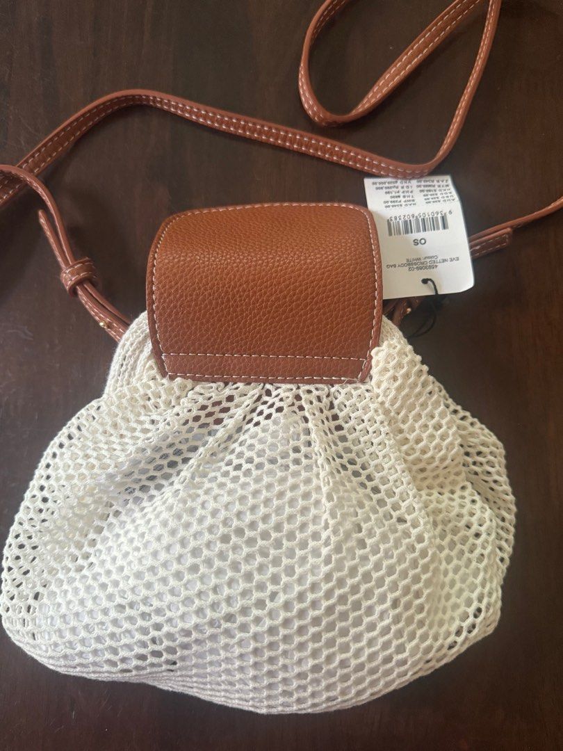 RUBI Eve Netted Cross Body Bag (Category: Cross-body Bags) located in Las Pinas. Submitted by kaye_dls (Listing ID 1347919493, Image 3). Description: ❗️FIXED PRICE ❗️ 💯 ORIGINAL FROM AUSTRALIA Brand New RUBI netted bag SRP:₱1,199 only selling for ₱500 pesos available in two colors green and white Very stylish and cute in person can fit small wallet and phone.