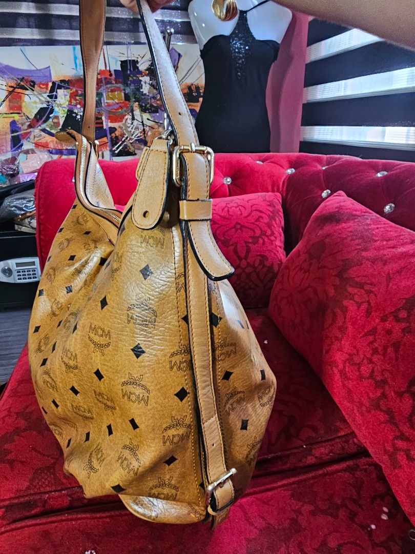 Auth Mcm Germany hobo bag large size (Category: Luxury Bags & Wallets) located in Las Pinas. Submitted by liezel49 (Listing ID 1348057126, Image 3). Description: good condition see pics posted.