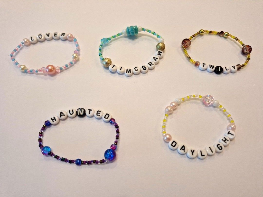 Beaded taylor swift bracelets (Category: Bracelets) located in Singapore. Submitted by st4rstrung (Listing ID 1348119840, Image 1). Description: - 15 cm in length - beads are fragile and may break if dropped - payment: paynow at meetups - minimum buy 3, if buy more will give discount (dm to negotiate).