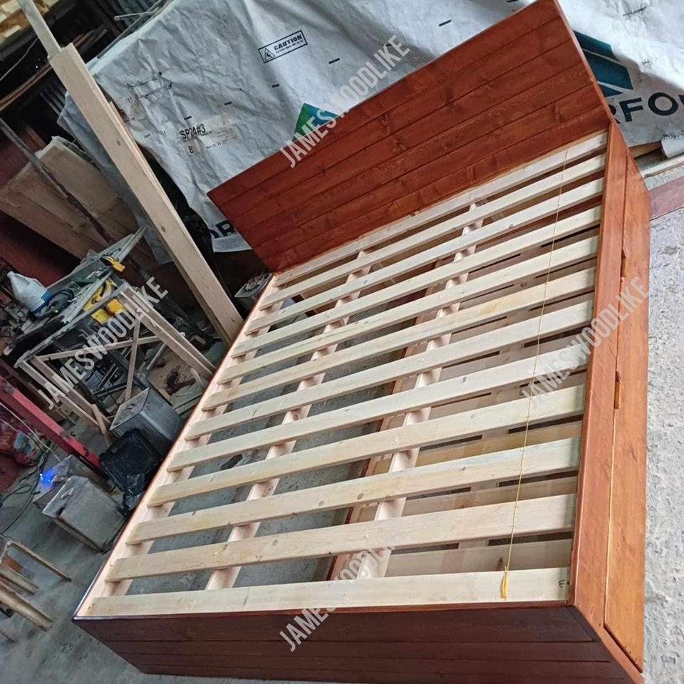 Bed Frame with pull out bed (Category: Bed Frames & Mattresses) located in General Trias. Submitted by jameswoodlike (Listing ID 1348104643, Image 3). Description: Here's a Bed with Pull out bed perfect for you and your family! "✨ Bed with Pull out Bed✨" ✅ KING SIZE BED 72x78 ✅ With Single size pull out bed ✅ With Mahogany stained finish For interested customers ‼️𝙈𝙀𝙎𝙎𝘼𝙂𝙀 𝙐𝙎 𝙉𝙊𝙒‼️ We use 100% Solid Brand New Wood! Kaya sigurado ang ti