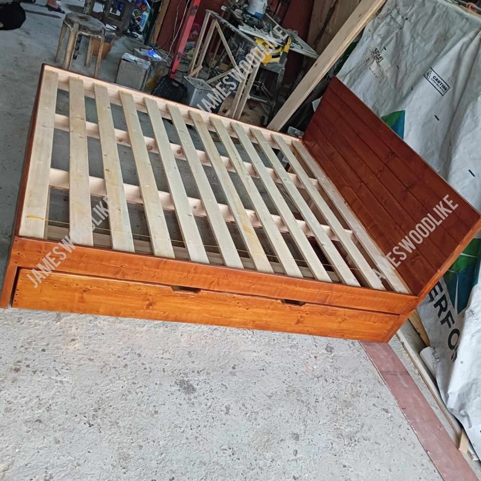 Bed Frame with pull out bed (Category: Bed Frames & Mattresses) located in General Trias. Submitted by jameswoodlike (Listing ID 1348104643, Image 2). Description: Here's a Bed with Pull out bed perfect for you and your family! "✨ Bed with Pull out Bed✨" ✅ KING SIZE BED 72x78 ✅ With Single size pull out bed ✅ With Mahogany stained finish For interested customers ‼️𝙈𝙀𝙎𝙎𝘼𝙂𝙀 𝙐𝙎 𝙉𝙊𝙒‼️ We use 100% Solid Brand New Wood! Kaya sigurado ang ti