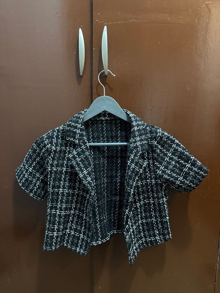 Black plaid wool coordinates (Category: Sets or Coordinates) located in Makati City. Submitted by celinuhh (Listing ID 1348068652, Image 1). Description: Terno cropped short sleeves and skort set.
