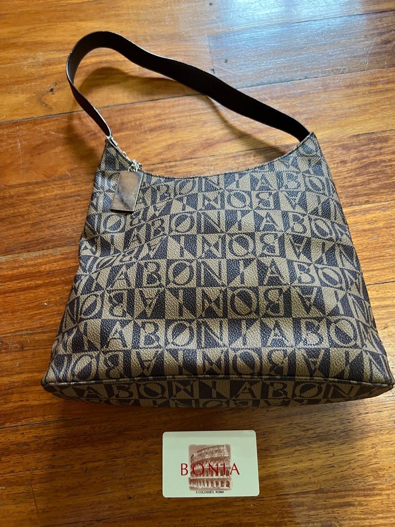 BONIA Monogram Shoulder Bag (Category: Luxury Bags & Wallets) located in San Juan City. Submitted by jannnnn__ (Listing ID 1348052693, Image 2). Description: Bonia Monogram Shoulder Bag Brand: Bonia Design: Monogram w/ authentication card RFS: decluttering Barely used. Good as new..