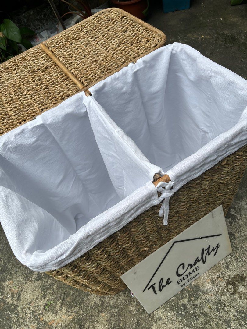 BURI HAMPER DUAL COMPARTMENT WITH CLOTH (Category: Laundry Baskets) located in Marikina City. Submitted by thecraftyhomebyelisha (Listing ID 1348116215, Image 1). Description: LAUNDRY BASKET DUAL COMPRTMENT WITH CLOTH 1800 L: 22" W: 13" H: 22" Loc. Marikina.