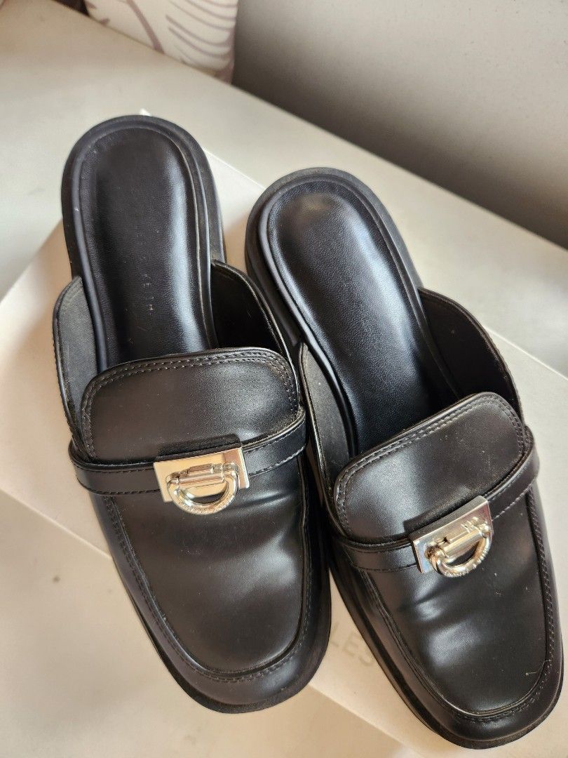 Charles & Keith Black Leather Mules (Category: Loafers) located in Quezon City. Submitted by bea_beee (Listing ID 1348043469, Image 2). Description: Charles & Keith Black Leather Mules Slightly used Still in excellent condition Size: 35 RFS: Decluttering.
