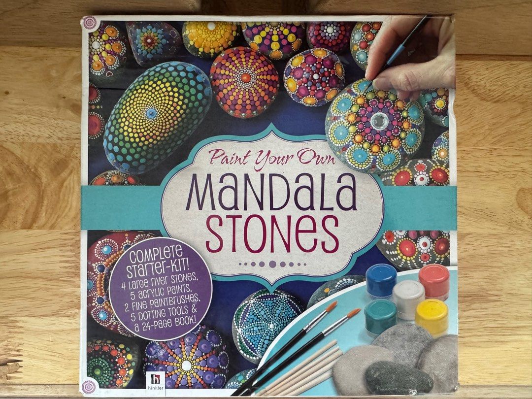 DIY Mandala Stones (Category: Craft Supplies & Tools) located in Plaridel. Submitted by oliviasattic (Listing ID 1348030296, Image 1). Description: Paint your own Mandala stones kit Complete 4 large river stones 5 acrylic paint 2 fine paint brush 5 dotting tools 24 page book *Na open lang po un box *as is.