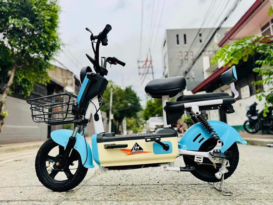 LIGHTSPEED THUNDER CANDY SERIES⚡️ 2-WHEELS E-BIKE 🛵 (Category: Bicycles) located in Marikina City. Submitted by keionlines85428 (Listing ID 1348028629, Image 1). Description: LIGHTSPEED THUNDER CANDY SERIES⚡️ 2-WHEELS E-BIKE 🛵 ₱11,500 ✅FREE ASSEMBLE ✅FREE HELMET ✅WITH CERT OF OWNERSHIP SPECS: ▪️NEW DIGITAL GAUGE ▪️Digital display control ▪️450 watts ▪️48V12Ah battery ▪️10-15 Km Range ▪️30-35 Kph Speed ▪️14"x2.50" Tubeless Tire ▪️100kg Load capa
