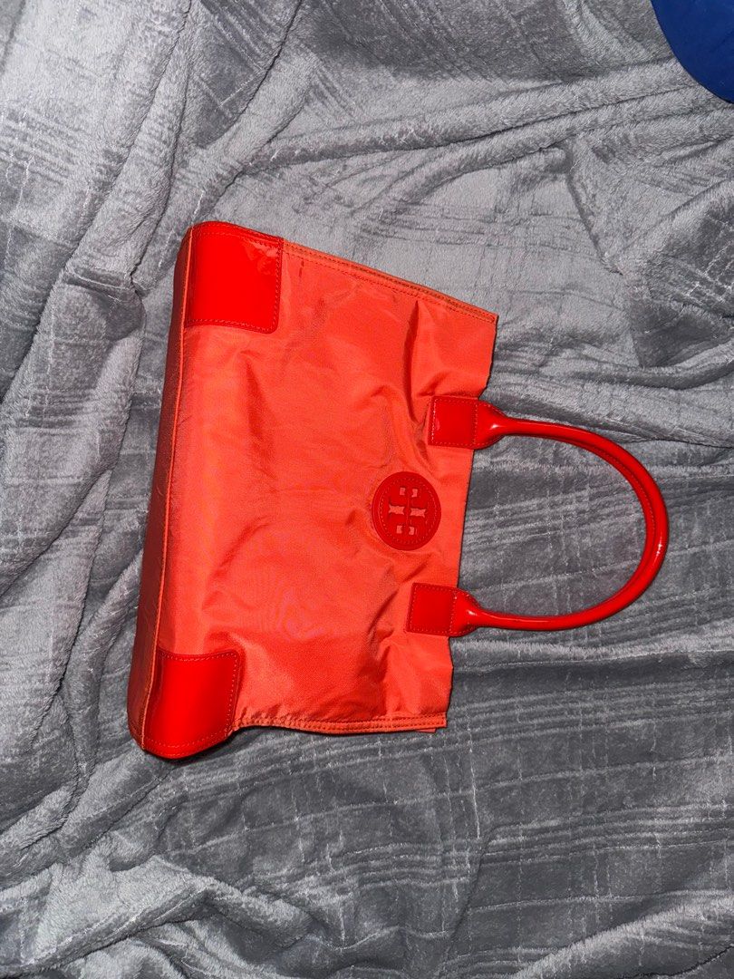 Tory Burch Ella Tote Small (Category: Luxury Bags & Wallets) located in Cabanatuan. Submitted by jaycapatrisha (Listing ID 1348032692, Image 2). Description: Tory Burch Ella Small Tote Bag Leather Nylon Lightweight Patent Logo Satchel Zip A lightweight tote bag neatly sized to fit all your everyday essentials. Crafted in durable nylon accented with patent leather trim. Great minimalist tote. Versatile— everyday wear, office, beach - Colour: Elect
